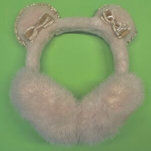 beige bear earmuffs with velvet bow details